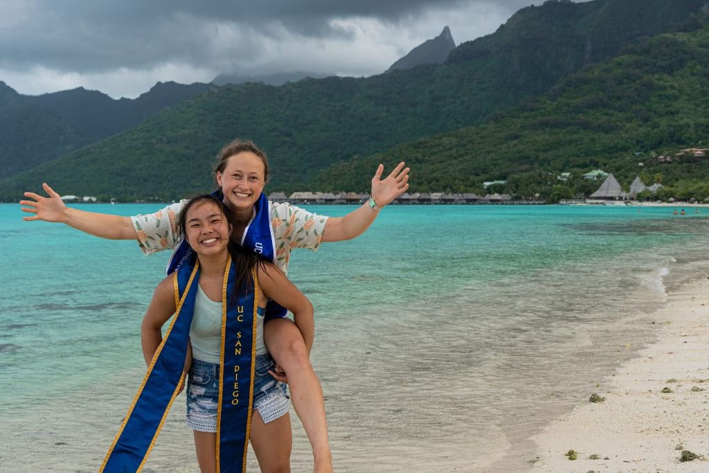 A picture of my friend and I at Temae Beach doing a little photoshoot with our graduation stoles. Taking pictures of the unbelievably clear water is a great way to end you day trip to Moorea.