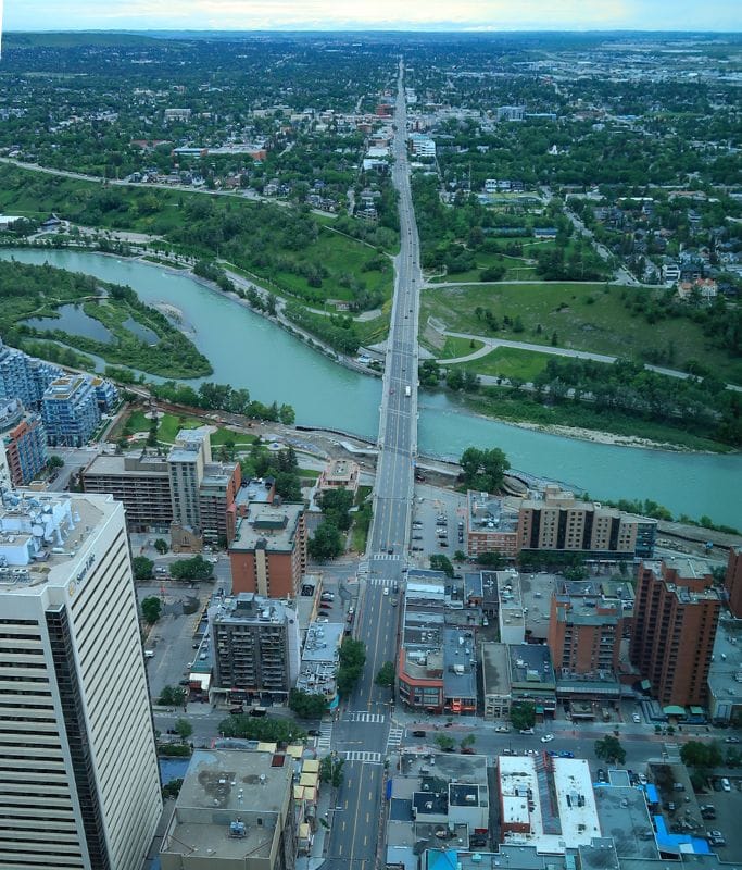 A picture of the aerial view from one of Calgary's tallest buildings. Here you can see Bow River and how dwarfed the other skyscrapers appear.