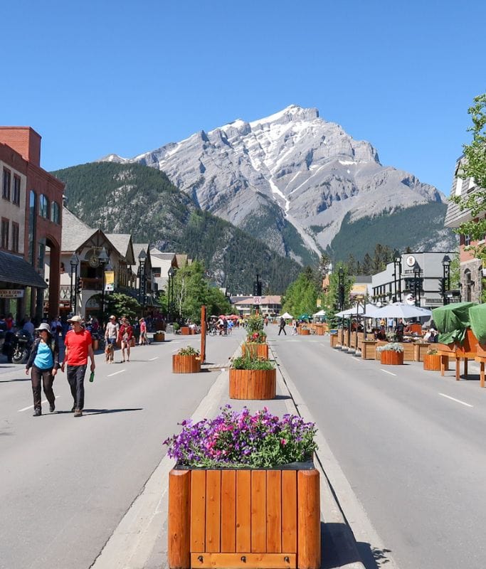 A picture of the main street, Banff Avenue, in Banff town, which is the third stop on our 4-Day Banff Itinerary.
