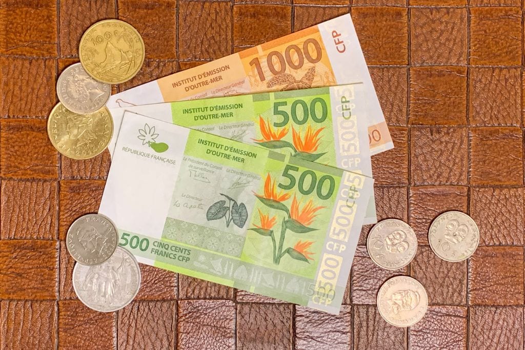 A picture of French Polynesian cash. Pack cash for your trip to Tahiti because many local vendors do not accept credit cards.