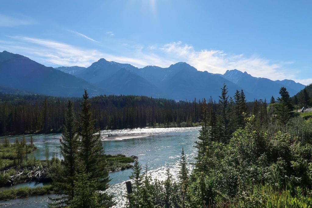 A picture of Bow River near the entrance to Banff National Park when driving from Calgary. This is a great pitstop while completing your 4-Day Banff Itinerary if you are coming in from Calgary.