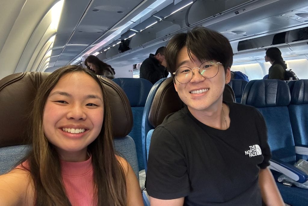 A picture of Kristin and her new friend that she made on her flight from HNL to Tokyo.