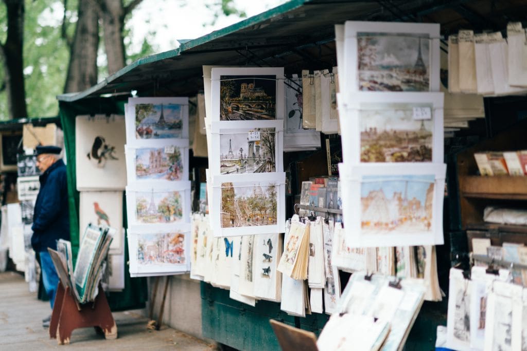 A picture of one of the merchant stalls located along the Seine River. I find that Paris is worth visiting just to peruse the local boutiques and take in the local culture.