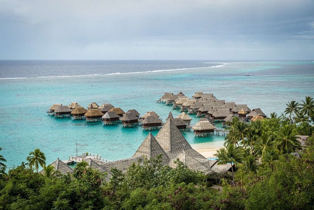 A picture of some overwater bungalows. I recommend skipping the overwater bungalow to lower costs for your vacation in Tahiti.