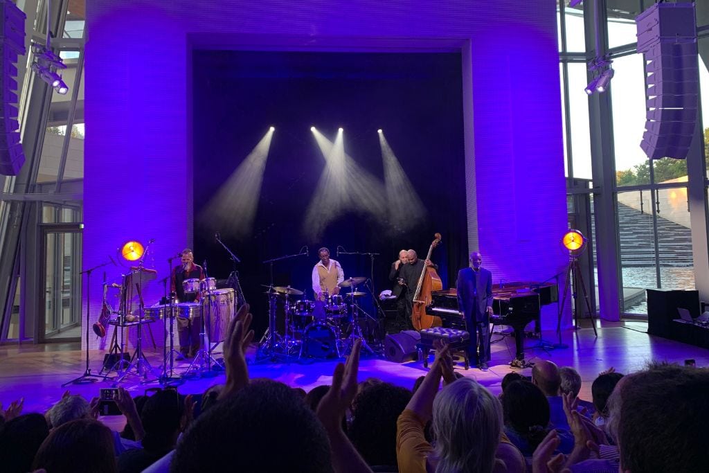 A picture of the main stage inside the Louis Vuitton Foundation Concert Hall from Ahmad Jamal's performance. Attending a performance here is sure to make your trip to Paris worth it and leave you with an unforgettable memory. 