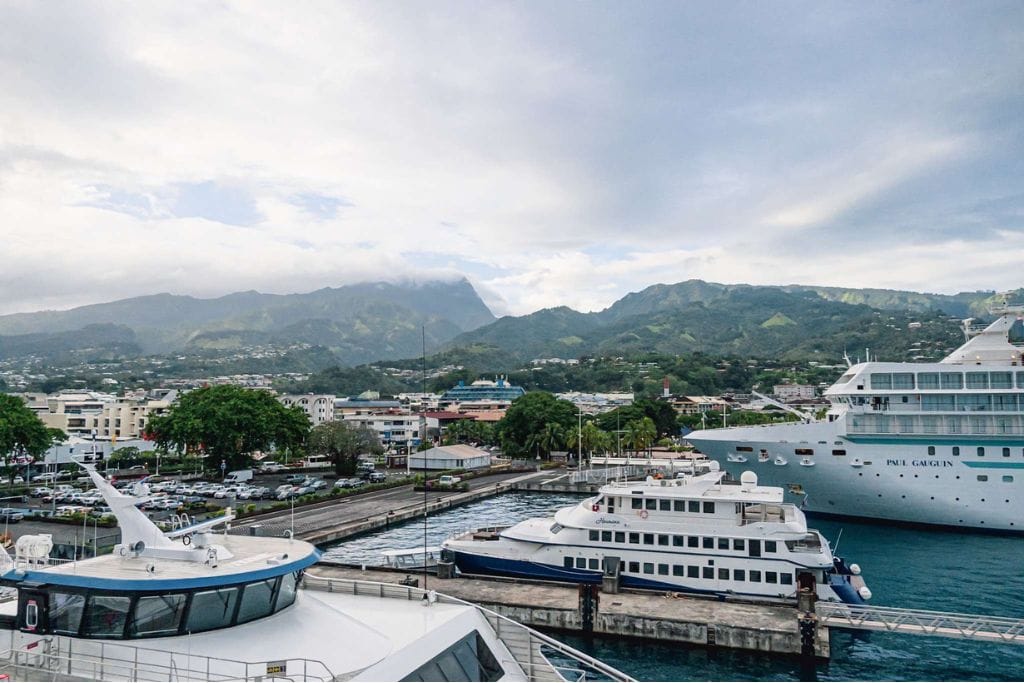 A picture of the ferries in the port at Papeete. If you day trip to Moorea, take the ferry to decreases expenses for your trip to Tahiti