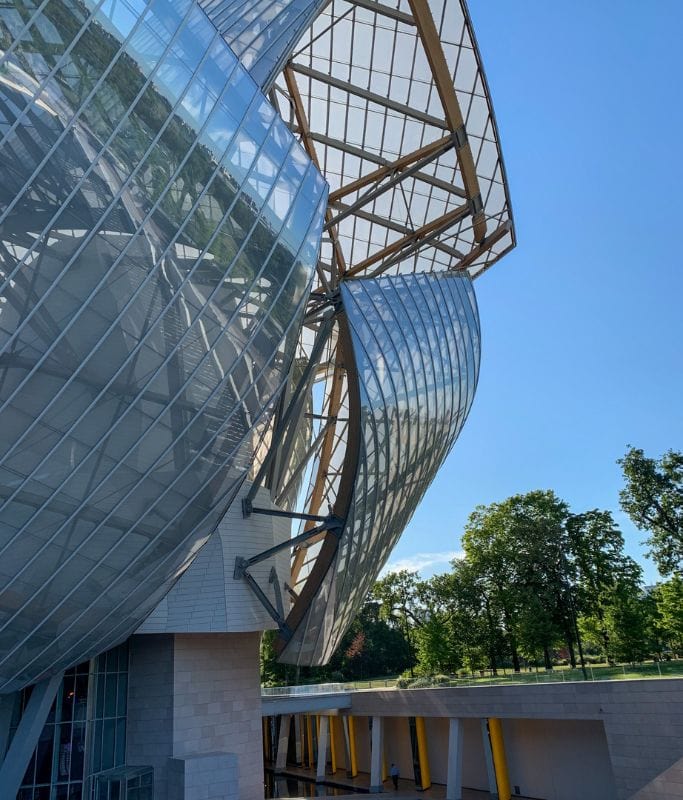 A picture of the exterior of the Louis Vuitton Foundation building in Paris.