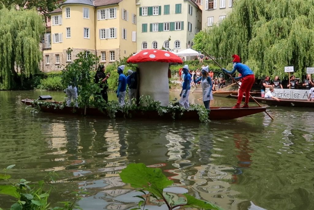 A picture taken from the annual punting competition in June. Pictured is a team dressed as smurfs! Witnessing this spectacle is a fun thing to do in tubingen is you can time your visit properly.