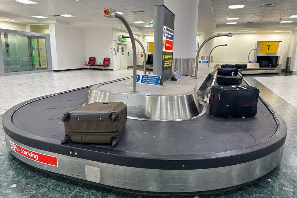 A picture of a baggage claim area within an airport.
