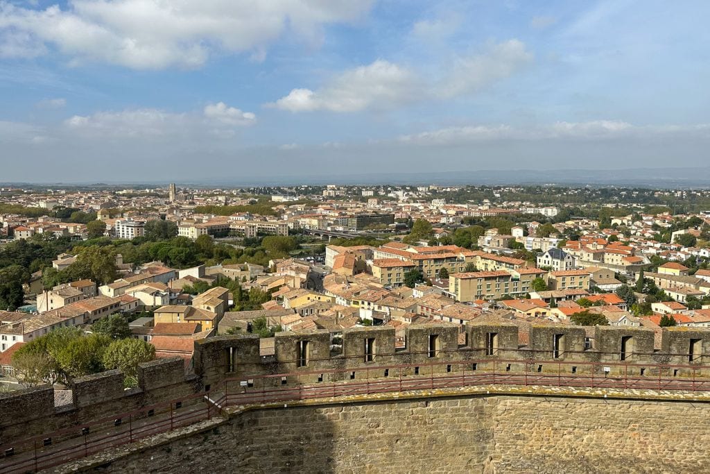 A picture of the red roofs and buildings in Carcassonne that can be seen from the ramparts of Chateau Comtal.