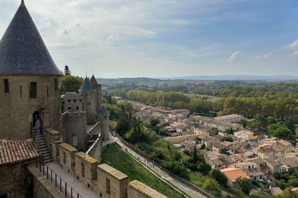 A picture of the western doubled walled ramparts in Chateau Comtal. Exploring the cité de Carcassonne is a must during your day trip from Toulouse. 