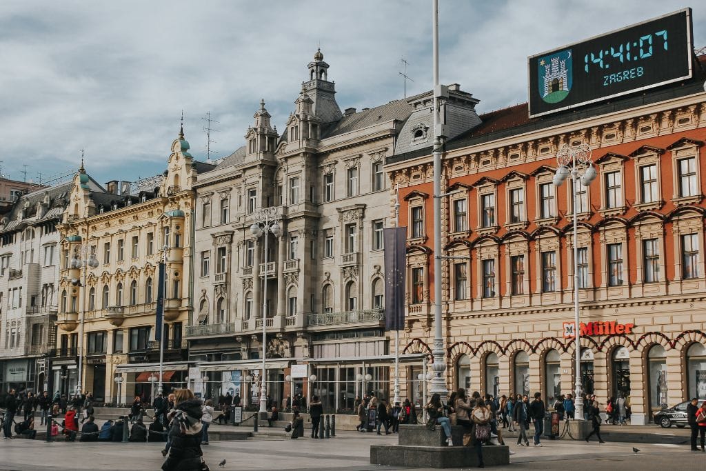 A picture of the main square in Zagreb with the different architectural styles on display.