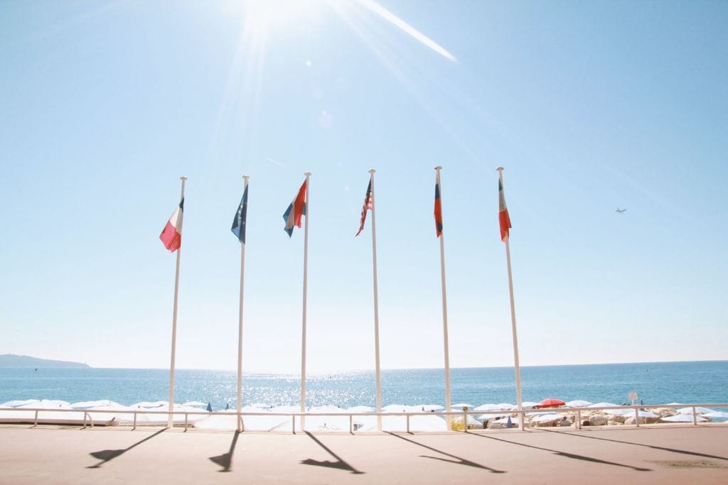 A picture of the flags that can be seen along the Promenade des Anglais. 