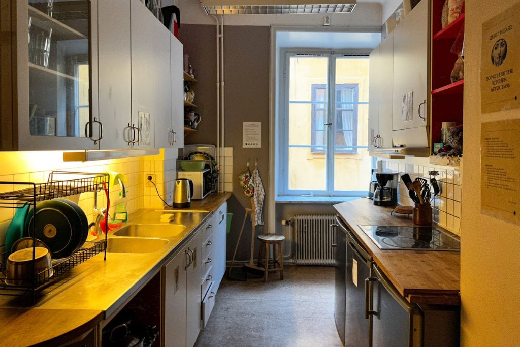A picture of the kitchen at Castanea Old Town Hostel Stockholm, which is available for anyone to use.
