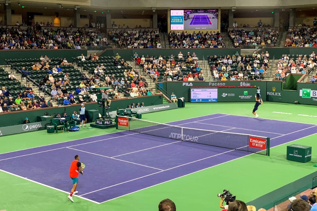 A picture of Nick Kyrgios playing at night match in Stadium 2.