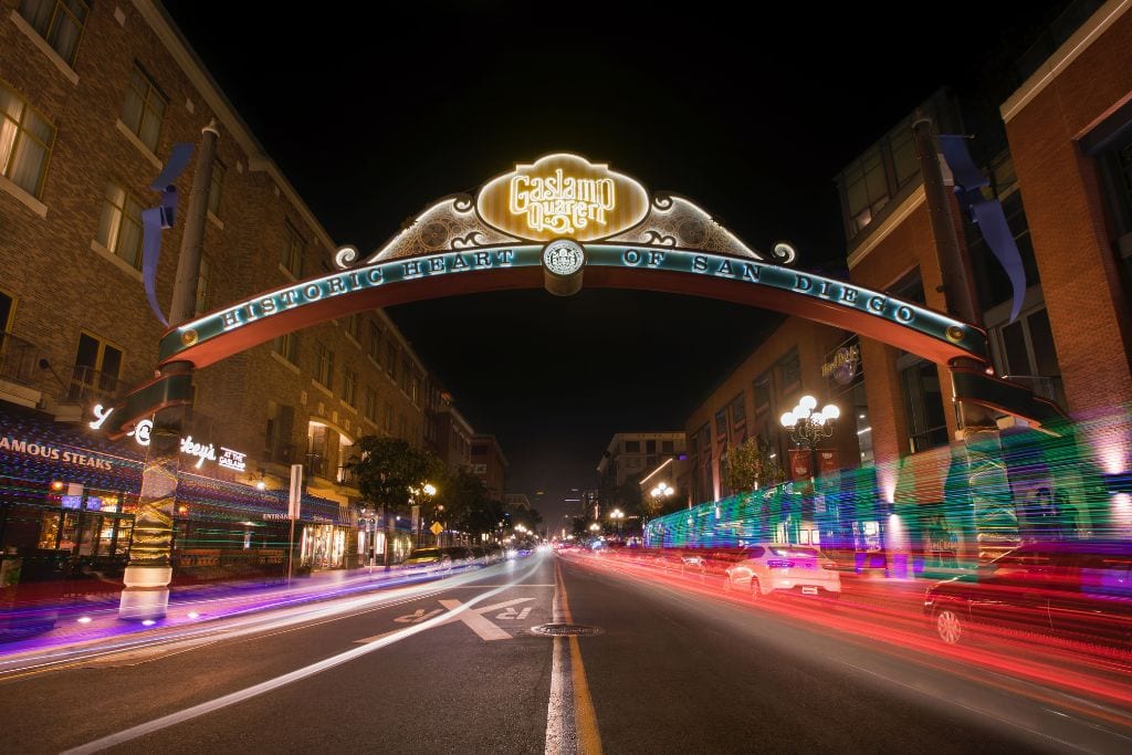 A picture of the gaslamp quarter sign that marks the entrance. A walking food tour is a great way to sample the local food scene.