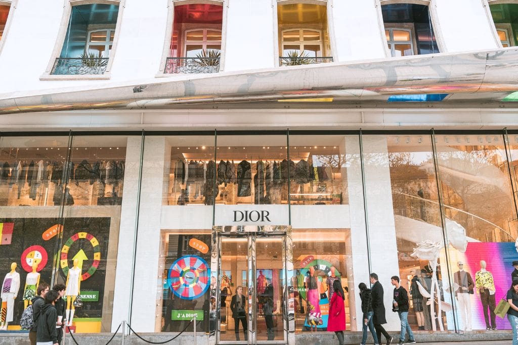 A picture of the Dior store on the Champs Elysees. Avoid Paris Syndrome by adjusting your expectations and budget!