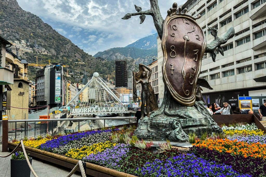 A picture of the Paris Bridge in the background and Dalí's Nobility of time in the front. You won't want to miss spending a couple of minutes here on your day trip to Andorra.