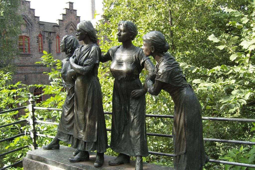 A picture of a statue in Oslo of four women. Some of the tours in Oslo focus on the unique street art and cultural side.