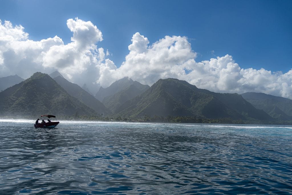 A picture of Tahiti's mountainous interior as seen from a boat.