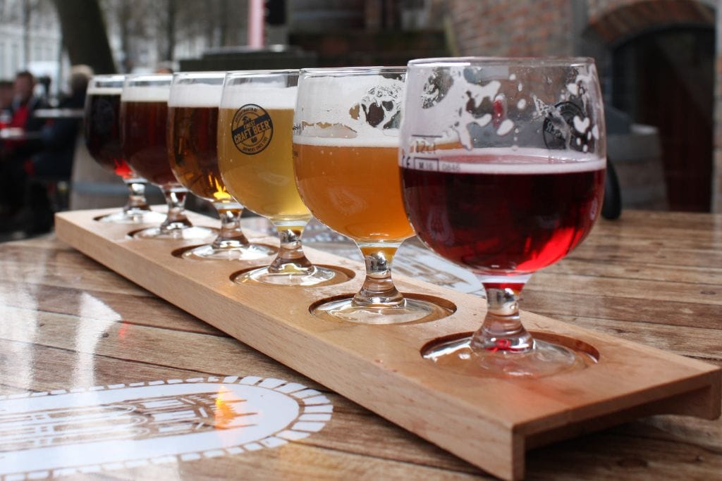 A picture of a flight of beers.