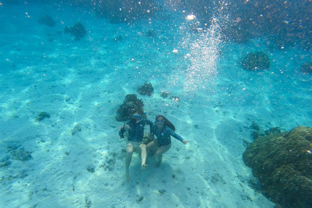 Just Kristin and her best friend snorkeling around Moorea! Explore these clear waters on one of the Moorea snorkeling tours.