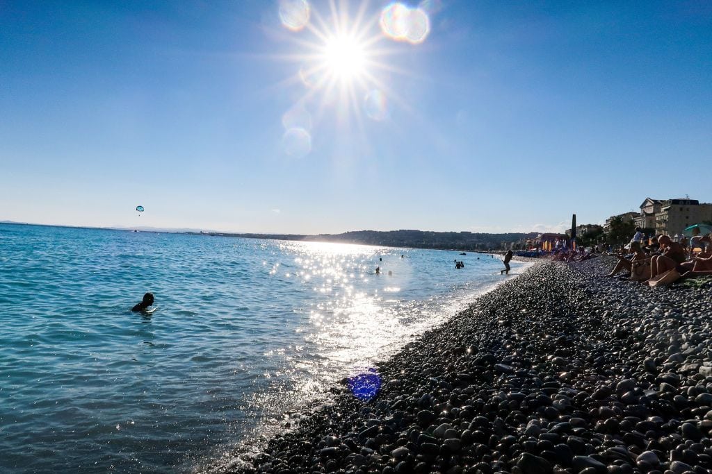 A picture of the beach in Nice. Nice has rocky beaches where as Monaco has sandy beaches.