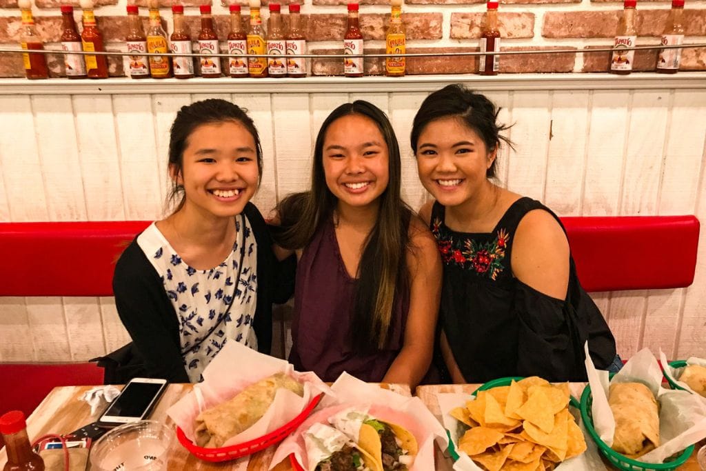 A picture of Kristin and her friends indulging in some Mexican food in San Diego