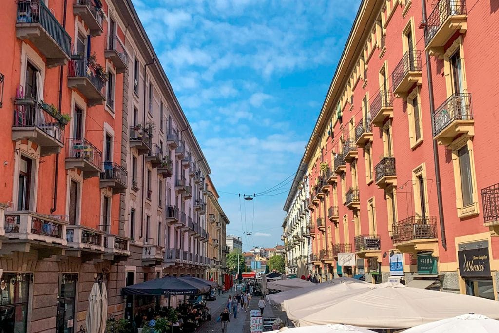 A picture of the restaurants on one of the streets in the Navigli district of Milan. Explore the food scene here with one of the Milan walking tours.