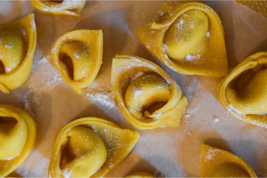 A picture of homemade pasta. There are food tours inn Milan that teach you how to make authentic Italian pasta