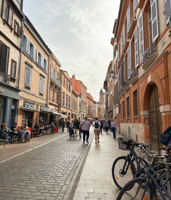 Another picture of the clean streets and pink hued buildings that can be found in Toulouse