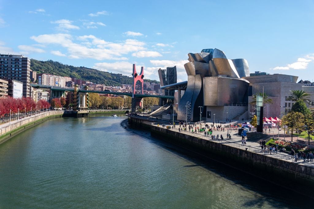 A picture of the Nervión River and Guggenheim Museum. A couple of the bilbao food tours will passby here and give you some background information about the iconic museum.