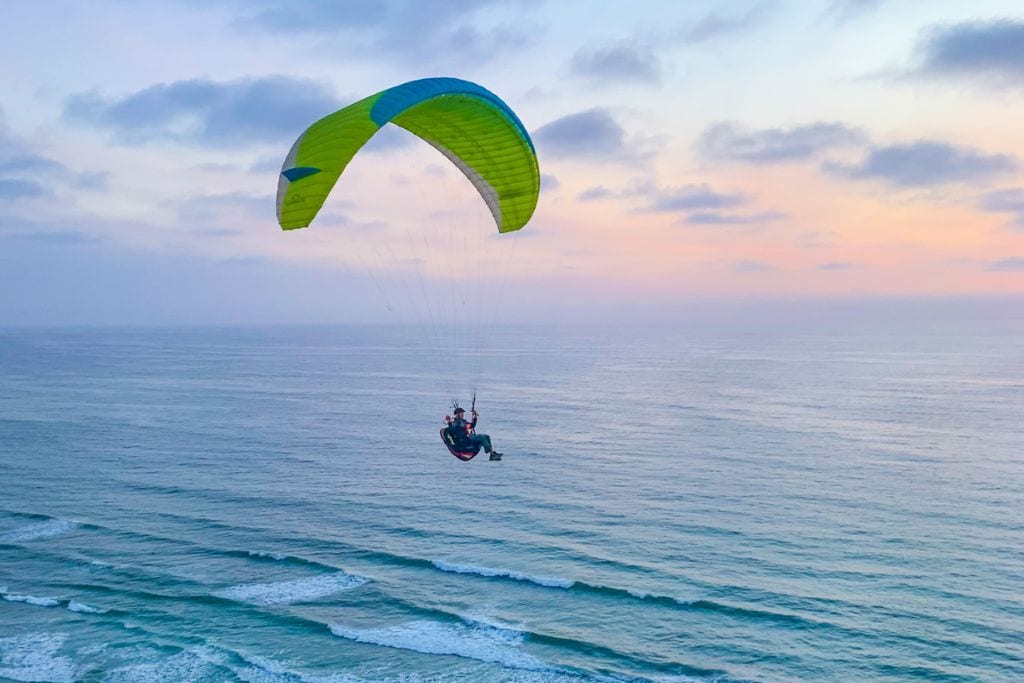 A picture of a person paragliding at Gliderport in San Diego.