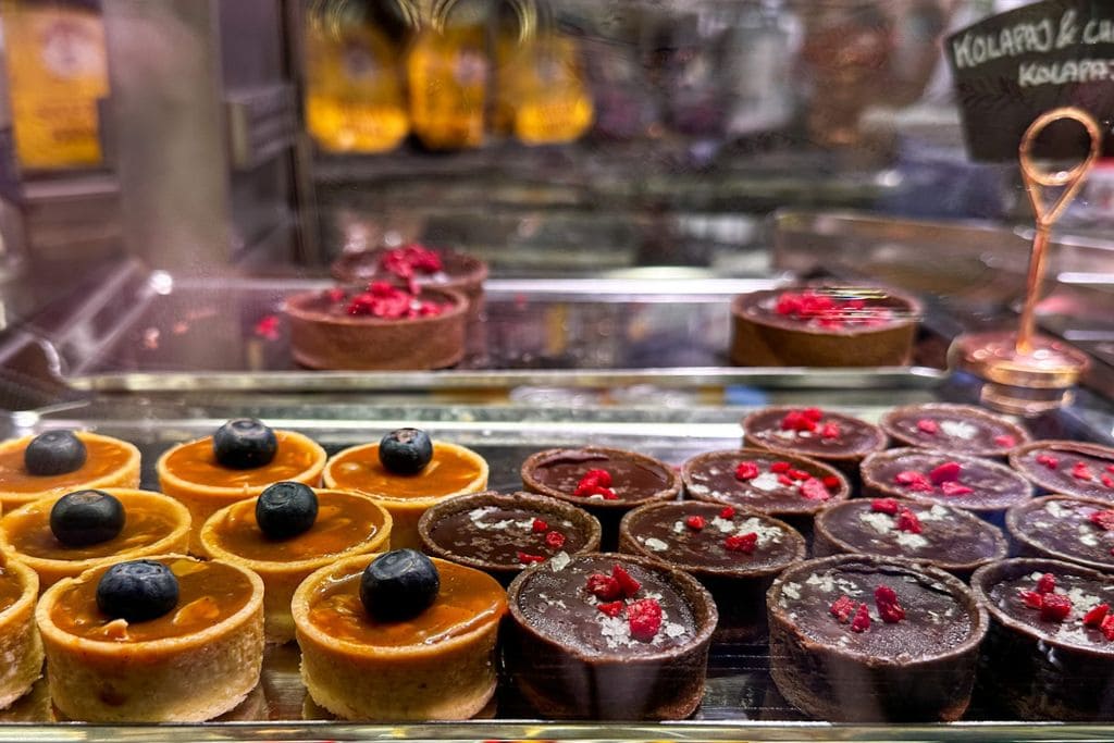 A picture of gourmet chocolates in Saluhall. Sample rich gourmet chocolates on one of the food tours in Stockholm.