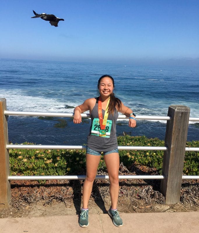 A picture of Kristin after completing the La Jolla Half Marathon.