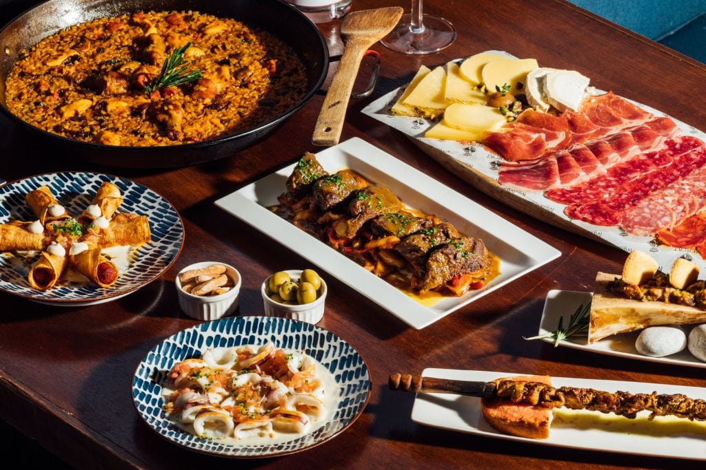 A picture of an assortment of Spanish food specialties.