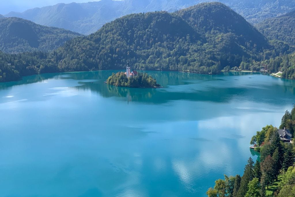 A picture of Lake Bled and Bled island from above! I find Lake Bled to be definitely worth visiting just to see these magnificent, panoramic views of the area!