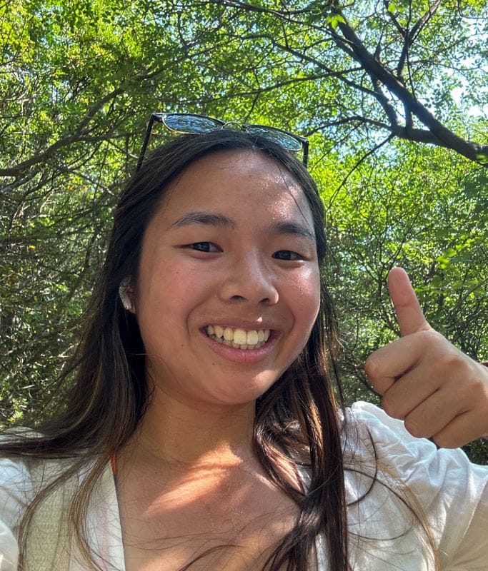 A selfie of Kristin sweating and internally dying while hiking the trail.