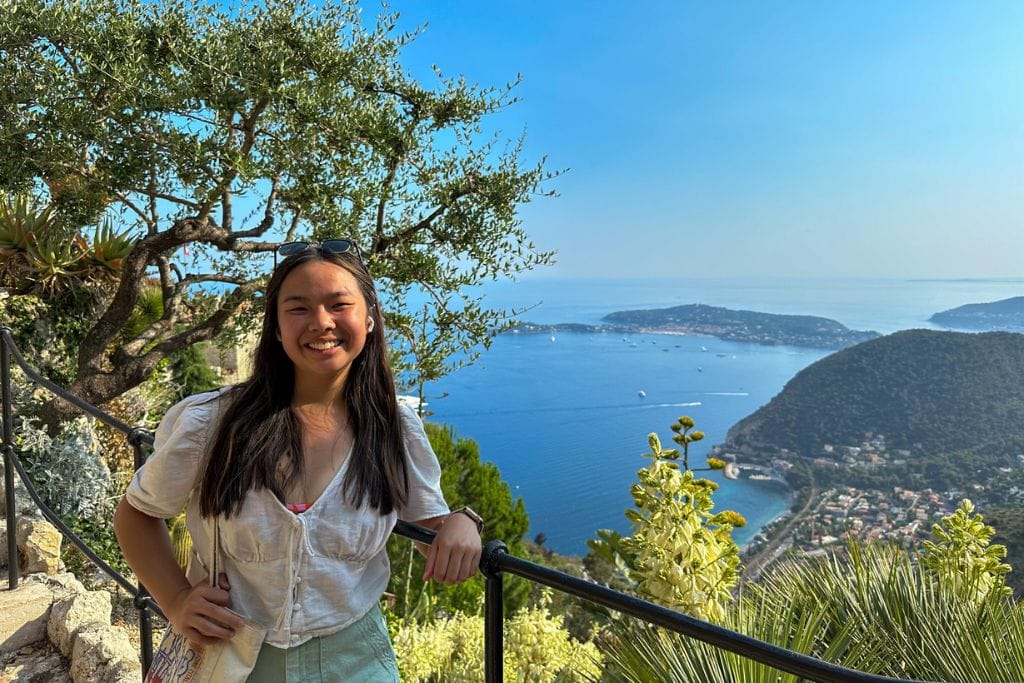 A picture of Kristin smiling while visiting Le Jardin Exotique in Eze!