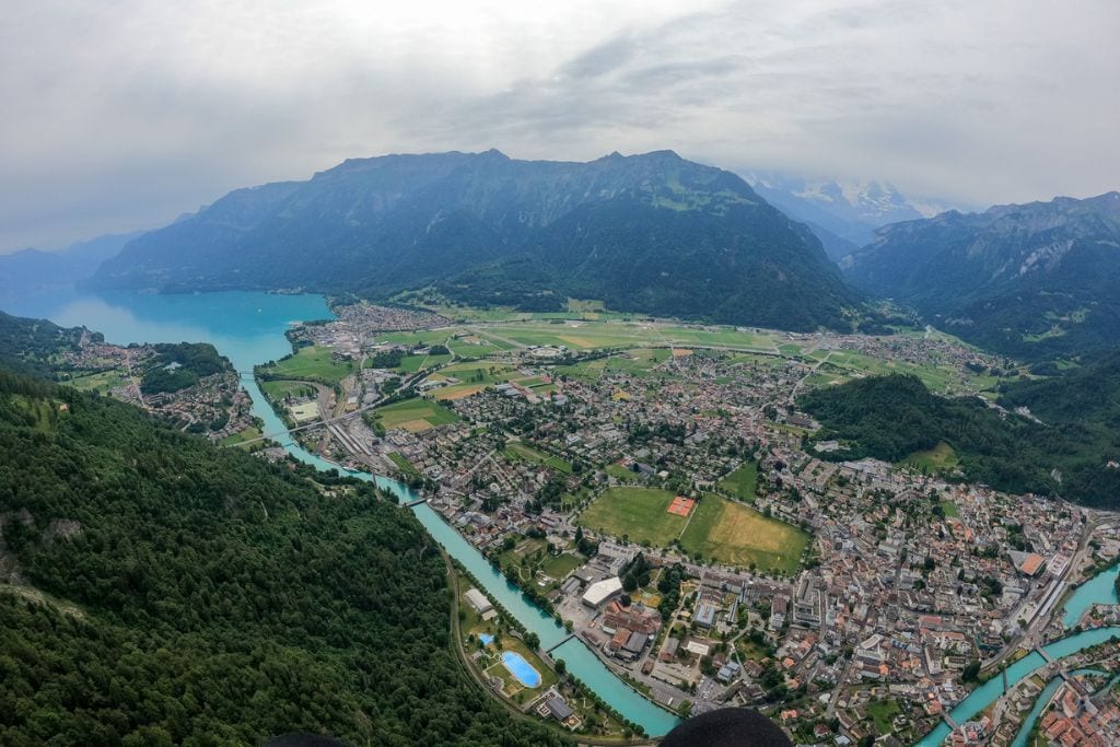 A picture of Interlaken, Lake Brienz, and the surrounding mountains I saw while paragliding in Interlaken.