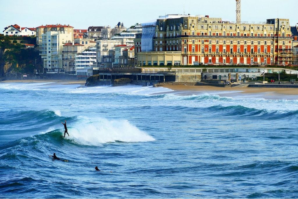A picture of a few people surfing some of the breaks at La Grande Plage. Surfing is a very popular thing to do in Biarritz, so if you are looking to learn to surf or already love it, there's hardly a better place to surf in France.