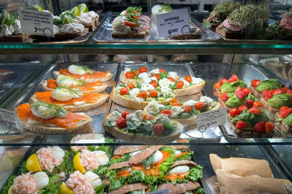 A picture of an assortment of open face sandwiches that I saw while on my Helsinki food tour. Several stalls of the in the local market halls sell everything you can thing of.