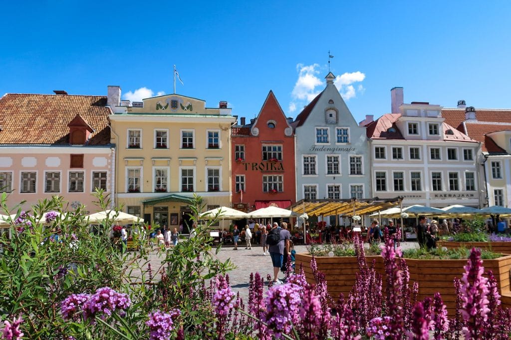 A picture of the colorful buildings that encompass Raekoja Plats or Town Hall Square.