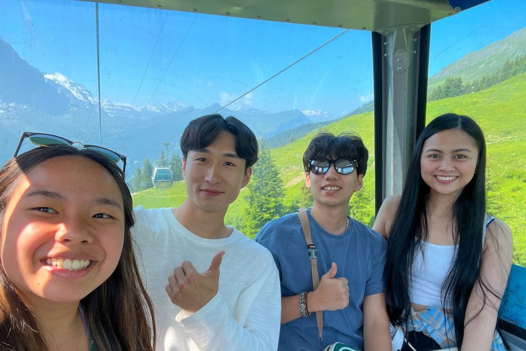 A picture of Kristin and some friends riding the Gondola up to Grindelwald First.