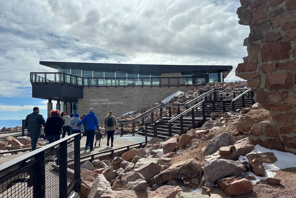 A picture of the Pikes Peak Summit Visitor Center. You can also see the snow on the ground.