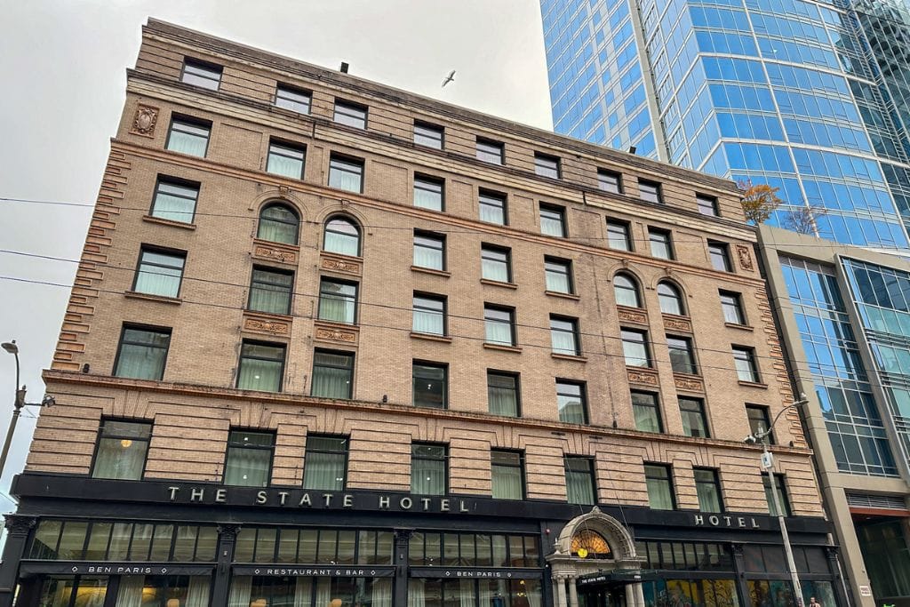 A picture of the exterior of the State Hotel in Seattle.