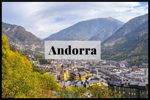 A picture of Andorra's scenic mountain views and small town below.