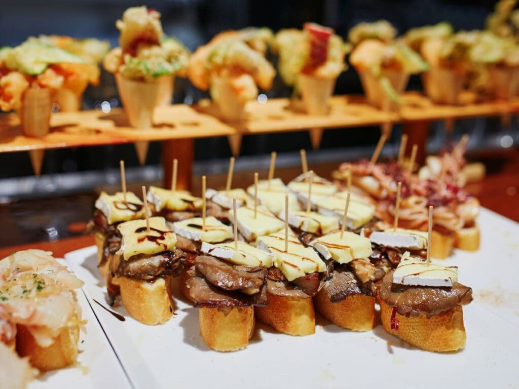 A picture of a plate of pintxos, traditional Basque food.
