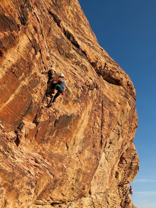 A picture of Kristin rock climbing at Red Rock Canyon.