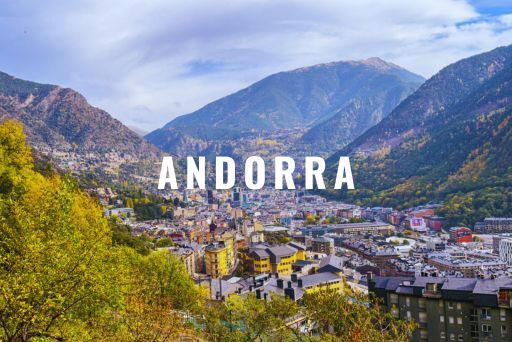 A picture of Andorra's scenic mountain views and small town below.